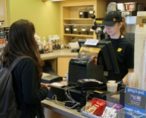 Barista Sarah Brown takes a customers order at Java City in the Central Michigan University's Park Library on Oct. 17, 2017.